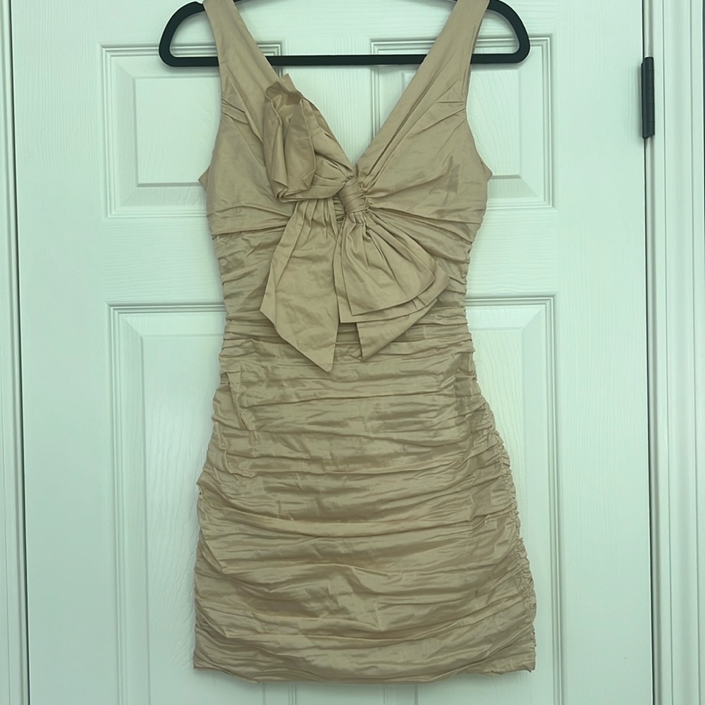 B2 by Jasmine pale lemon yellow bridesmaid dress featuring a romantic lace V-nec